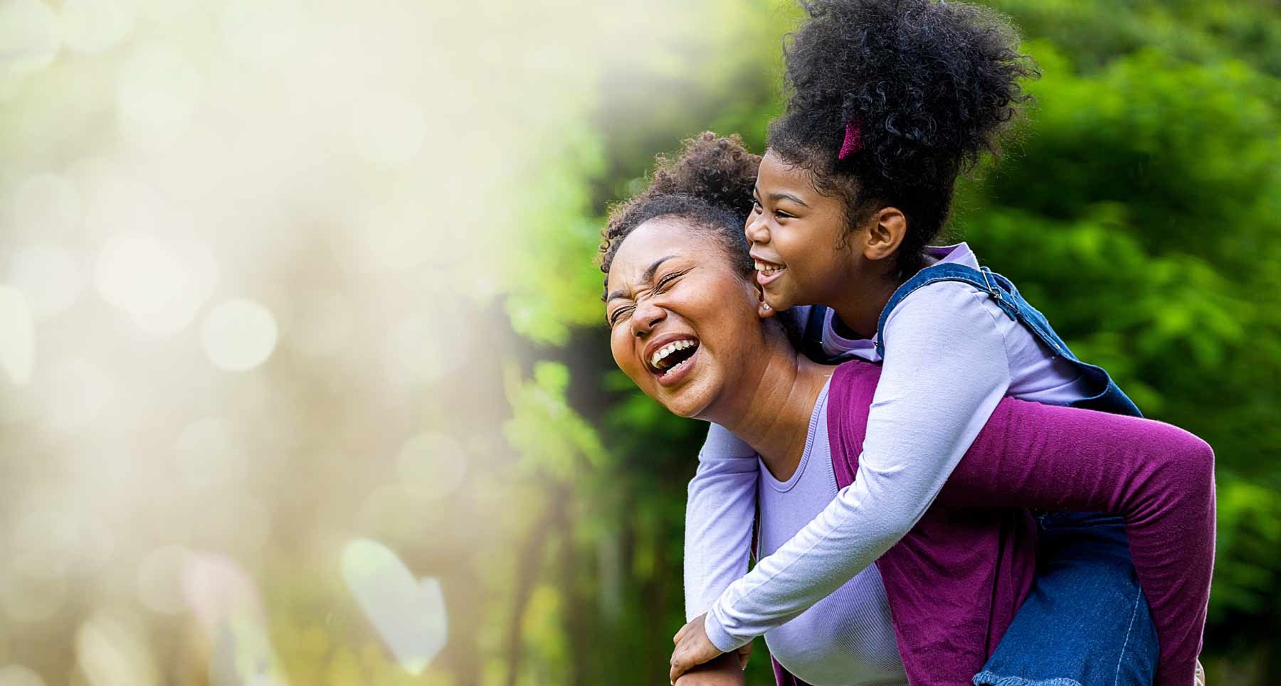 Woman and child playing happily
