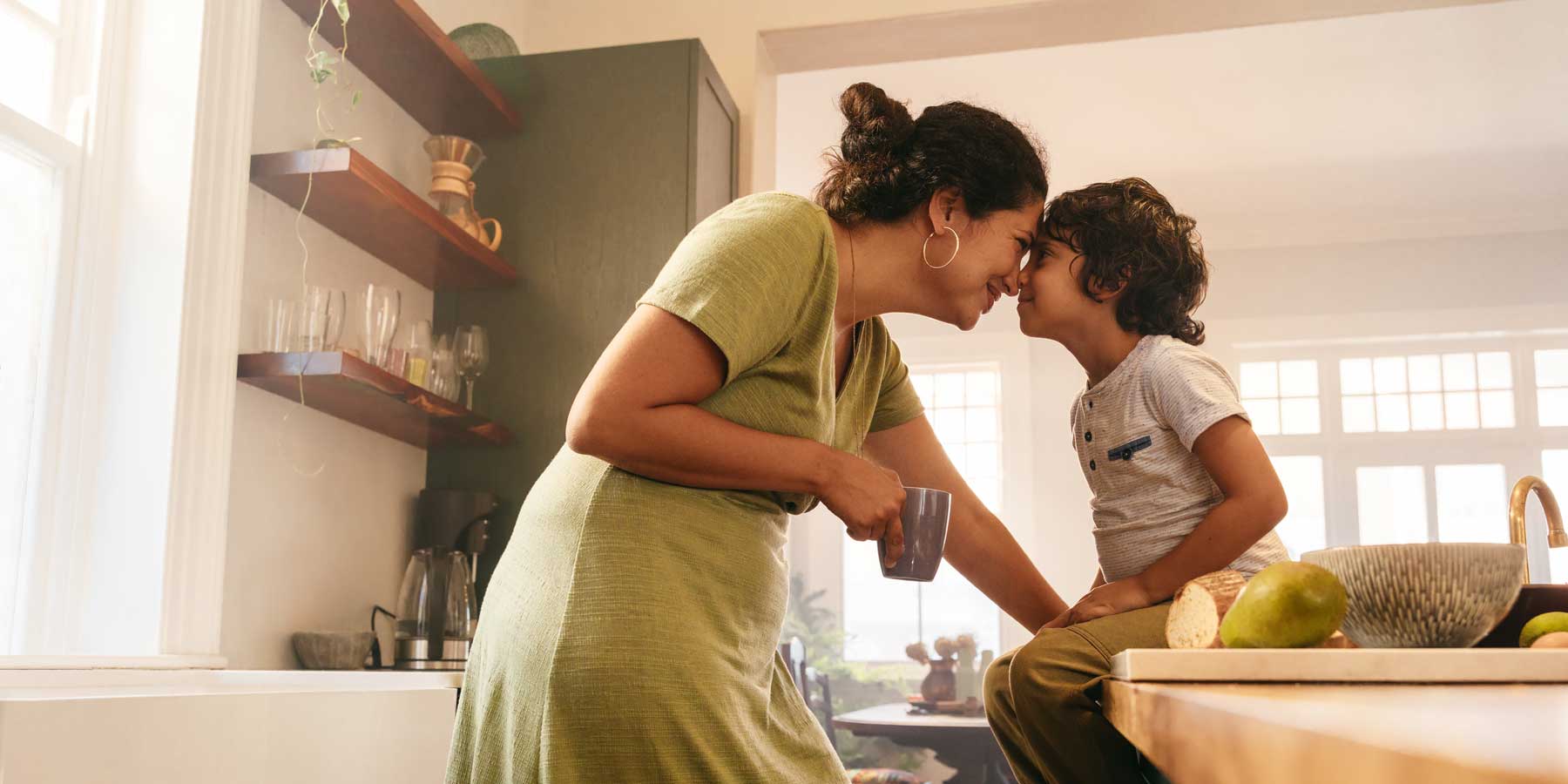 Happy mother and son being playful